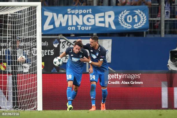 Mark Uth of Hoffenheim celebrates his goal with Sandro Wagner of Hoffenheim during the UEFA Champions League Qualifying Play-Offs Round First Leg...