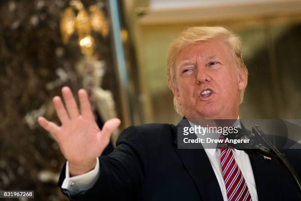 President Donald Trump delivers remarks following a meeting on infrastructure at Trump Tower, August 15, 2017 in New York City. He fielded questions...