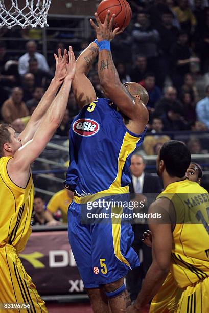 Hanno Mottola number 13 of Aris TT Bank and Marcus Fizer number 5 of Maccabi Elite Tel Avivin action during the Euroleague Basketball Game 14 between...