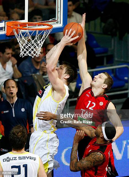 Mirza Teletovic of Tau Ceramica and Gasper Vidmar of Fenerbahce Ulker Istanbul , in action during the Euroleague Basketball Top 16 Game 2 between Tau...