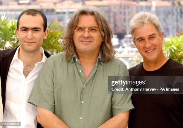 Actor Khalid Abdalla, Director Paul Greengrass and Ben Sliney pose for photographers during the photocall for United 93, at the Riviera Terrace in...