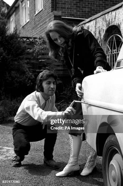 Photographer Ray Bellisario, the man in a minor road accident also involving the Earl of Snowdon. With him is his fiancee Anny Collin.