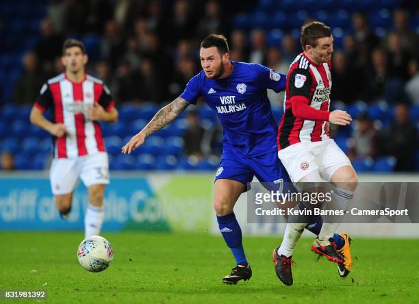 Cardiff City's Lee Tomlin is fouled by Sheffield United's John Fleck during the Sky Bet Championship match between Cardiff City and Sheffield United...
