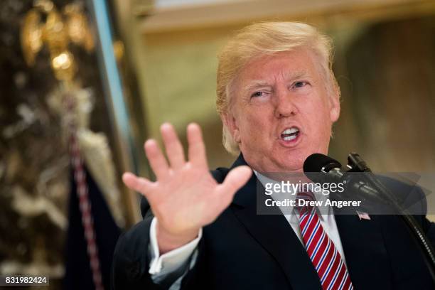 President Donald Trump speaks following a meeting on infrastructure at Trump Tower, August 15, 2017 in New York City. He fielded questions from...