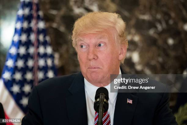 President Donald Trump speaks following a meeting on infrastructure at Trump Tower, August 15, 2017 in New York City. He fielded questions from...