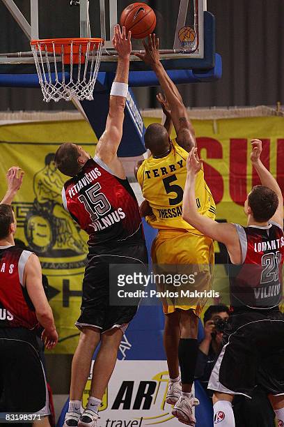Terry Reyshawn number 5 of Aris TT Bank and Petravicius Arijonas number15 of Lietuvos Rytas in action during the Euroleague Basketball Top 16 Game 6...