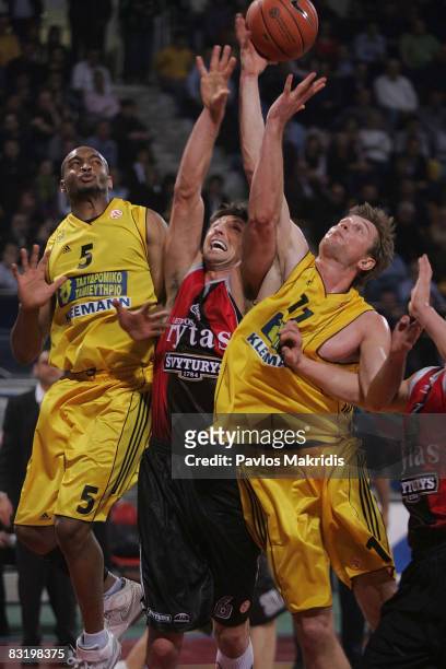 Terry Reyshawn number 5 and Boisa Vladimer number 11 of Aris TT Bank and Vroman Jackson number 6 in action during the Euroleague Basketball Top 16...