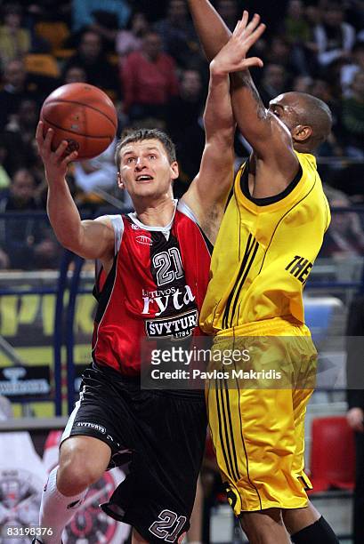 Washington Darius number 20 of Aris TT Bank and Jomantas Arturas number 21 of Lietuvos Rytas in action during the Euroleague Basketball Top 16 Game 6...