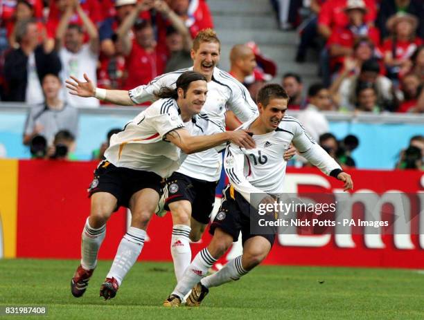 Germany's Philip Lahm celebrates scoring the opening goal of the World Cup against Costa Rica during the Group A World Cup match at the FIFA World...