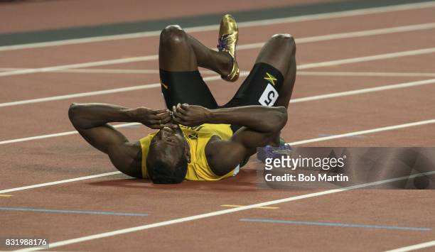 16th IAAF World Championships: Jamaica Usain Bolt down on track with injury during Men's 4X100M Final race at Olympic Stadium. Sequence. London,...