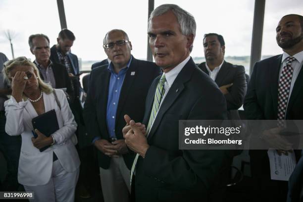 Representative Bob Latta, a Republican from Ohio, center, speaks while visiting the American Mobility Center in Ypsilanti, Michigan, U.S., on...