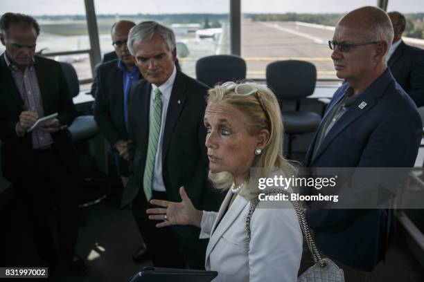 Representative Debbie Dingell, a Democrat from Michigan, center, speaks while visiting the American Mobility Center in Ypsilanti, Michigan, U.S., on...