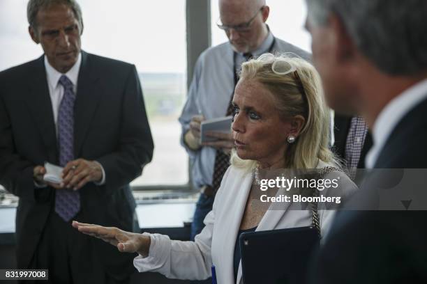 Representative Debbie Dingell, a Democrat from Michigan, center, speaks while visiting the American Mobility Center in Ypsilanti, Michigan, U.S., on...