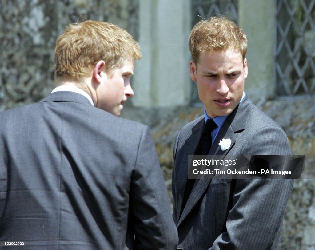 Prince Harry (left) and Prince William leave the funeral of the Duchess of Cornwall's father Major Bruce Shand at Holy Trinity c