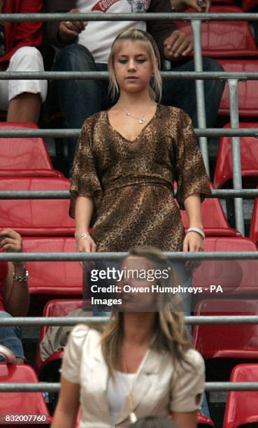 Coleen McLoughlin , fiancee of Wayne Rooney and Melanie Slade girlfriend of Theo Walcott in the stands before the match