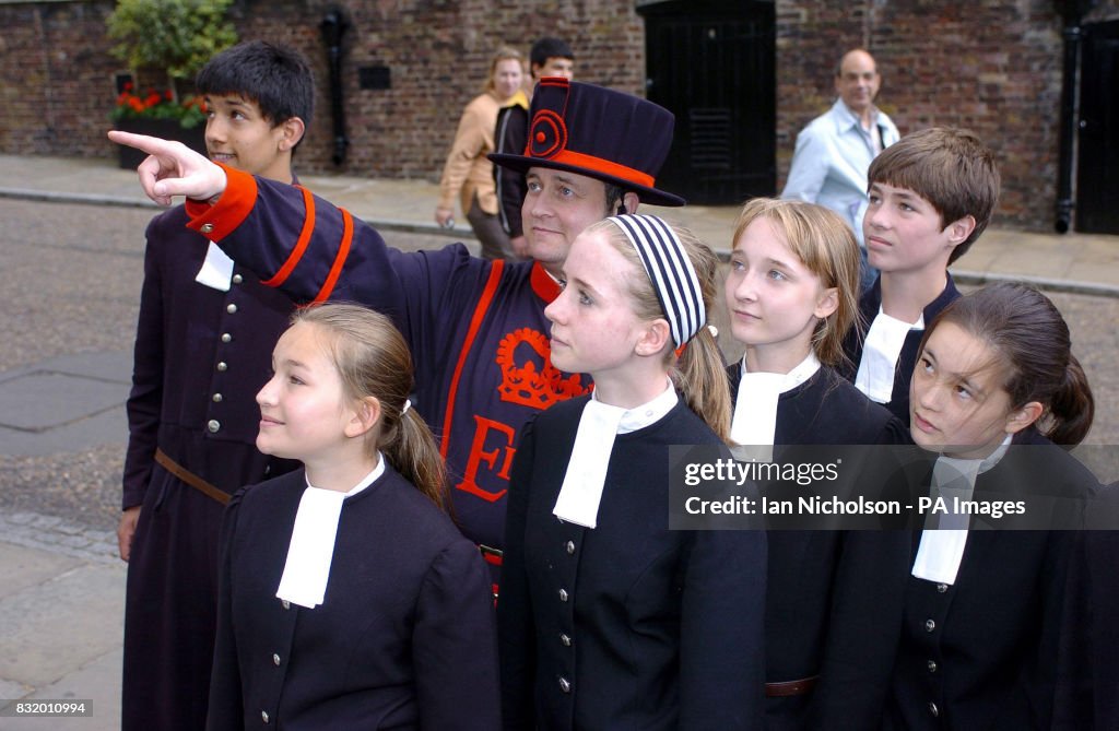 REQUEST FOR BRIGHTON ARGUS. Yeoman Warder Chris Skaife guides pupils of Christ's Hospital School, Brighton, during a visit to th