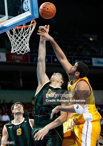 Aaron Bramlett of ASK Riga and Viacheslav Kravtsov of BC Kyiv in action during the ULEB Cup Game 7 between ASK Riga and BC Kyiv at the Arena Riga on...