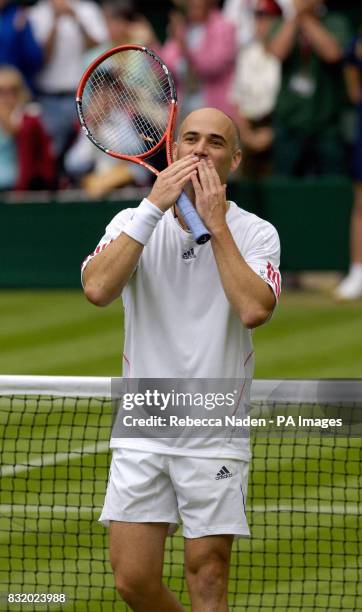 S Andre Agassi blows a kiss after his win against Serbia and Montenegro's Boris Pashanski during the first round of The All England Lawn Tennis...