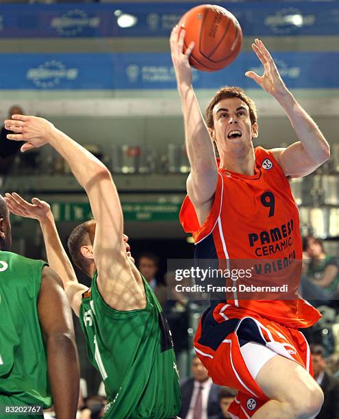 Victor Claver, # 9 of Pamesa Valencia, right, goes on the basket in front of Lubos Barton, #11 of DKV Juventud during the ULEB Cup Final 8...