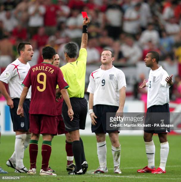 England's Wayne Rooney is sent off after stamping on Portugal's Alberto Ricardo Carvalho during the Quarter Final match at the FIFA World Cup Stadium...