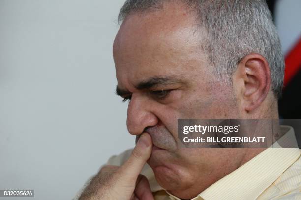 Grandmaster chess player Garry Kasparov contemplates a move during his match against grandmaster Levon Aronian during day two of the Grand Chess Tour...
