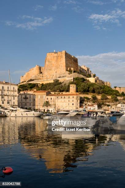 bonifacio citadel and reflections in the harbour , corse du sud, corsica , france - bonifacio stock pictures, royalty-free photos & images