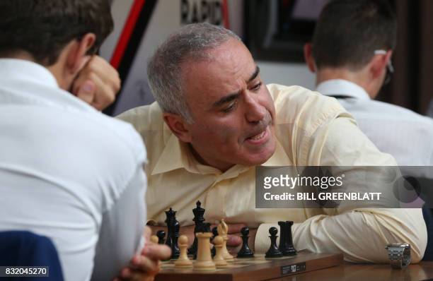 Grandmaster chess player Garry Kasparov looks away from the board during a match against grandmaster Levon Aronian on day two of the Grand Chess Tour...