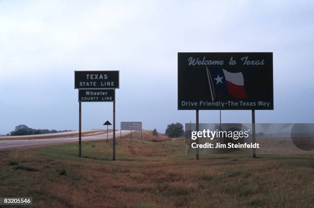 Welcome to Texas sign along highway against a cloudy sky on Septemeber 27, 1995.