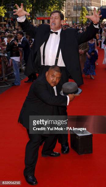 Actors impersonating James Bond villains Odd Job and Jaws arrive for the premiere of Stormbreaker, from the Vue West End, Leicester Square, central...