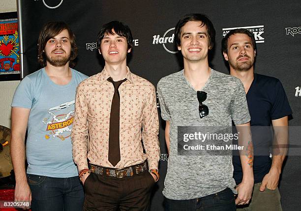 Members of the band Panic at the Disco drummer Spencer Smith, guitarist Ryan Ross, frontman Brendon Urie, and bassist Jon Walker appear at the Hard...