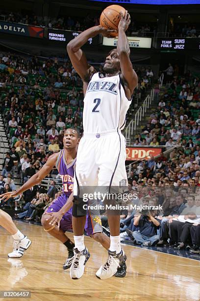 Brevin Knight of the Utah Jazz takes the shot against the Phoenix Suns at EnergySolutions Arena on October 09, 2008 in Salt Lake City, Utah. NOTE TO...