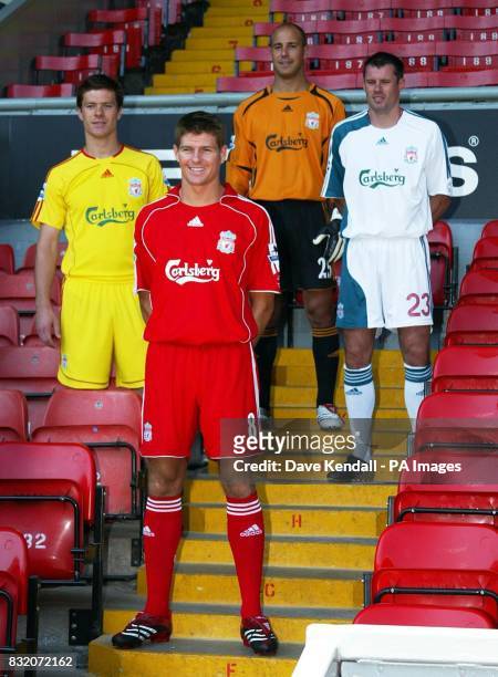 Liverpool's Xabi Alonso , Steven Gerrard, Jose Reina and Jamie Carragher display the new kits at Anfield Stadium, Liverpool.
