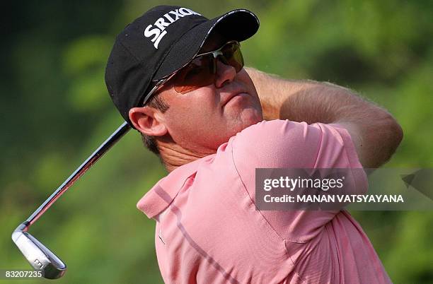 New Zealand golfer Mark Brown tees off on the eighteenth hole during the second round of the Hero Honda Indian Open at the Delhi Golf Club in New...