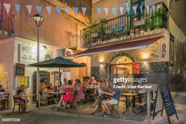 restaurant at bonifacio old town,evening picture corse du sud , corse, corsica france - corse du sud stock pictures, royalty-free photos & images