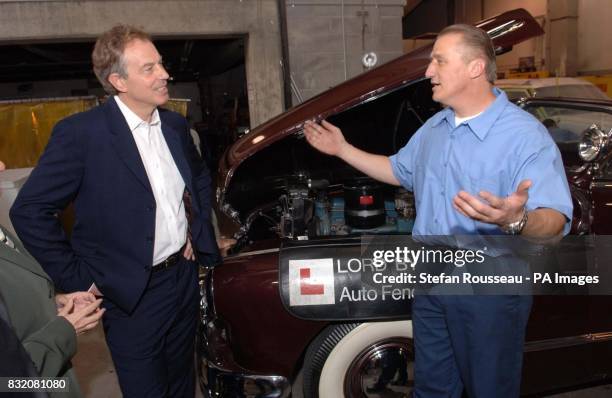 Britain's Prime Minister Tony Blair meets ex offenders in the car workshop at the Delancey Street Foundation, a rehabilitation project in San...