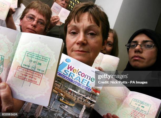 Dr Lynne Jones MP , and Tahra Bibi surrounded by the other British women who were part of a group who were yesterday deported from Israel while on a...