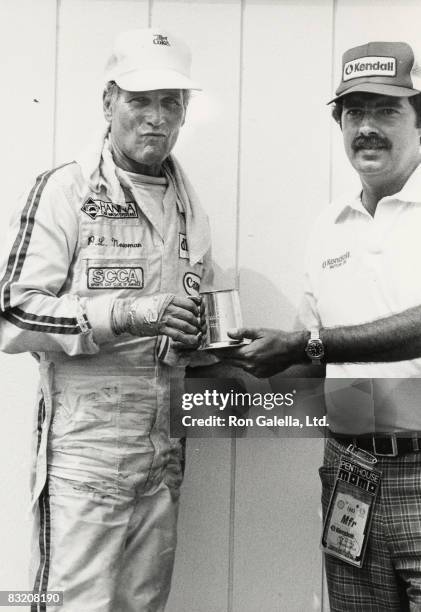 Paul Newman and pit crew member