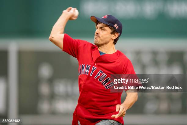 Actor Casey Affleck looks on throws out the ceremonial first pitch during a Jimmy Fund Radio-Telethon pre-game ceremony before a game between the...