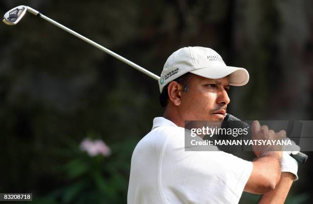 Indian golfer Jeev Milkha Singh tees off during the second round of the Hero Honda Indian Open at the Delhi Golf Club in New Delhi on October 10,...