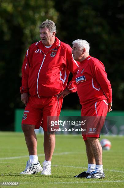 Head coach John Toshack chats with assistant Roy Evans during Wales football training ahead of their World Cup Qualifier tomorrow against...