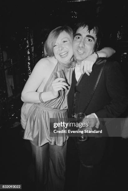 British drummer Keith Moon with American beauty queen Joyce McKinney at 'Saturday Night Fever' film premiere, London, UK, 23rd March 1978.
