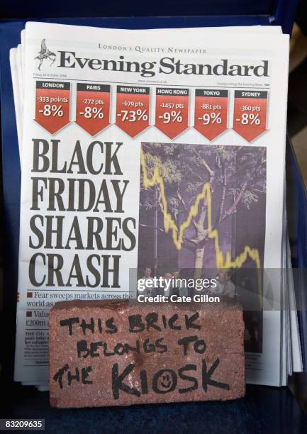 The Evening Standard newspapers on sale outside a newsagents on October 10, 2008 in London, England. Shares worldwide have fallen dramatically as...