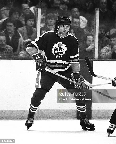 Dave Semenko of the Edmonton Oilers skates in game against the Boston Bruins at Boston Garden .