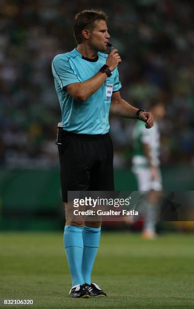Referee Felix Brych from Germany in action during the UEFA Champions League Qualifying Play-Offs Round - First Leg match between Sporting Clube de...