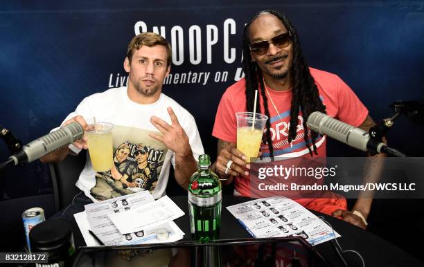 SnoopCast commentators Urijah Faber and Snoop Dogg pose for a photo during Dana White's Tuesday Night Contender Series at the TUF Gym on August 15,...