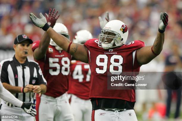 Arizona Cardinals defensive tackle Gabe Watson gestures for noise from the crowd during a game against the Buffalo Bills on October 5, 2008 at...