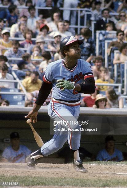 First baseman Rod Carew of the Minnesota Twins swings and watches the flight of his ball during a MLB baseball game circa early 1970's. Carew played...