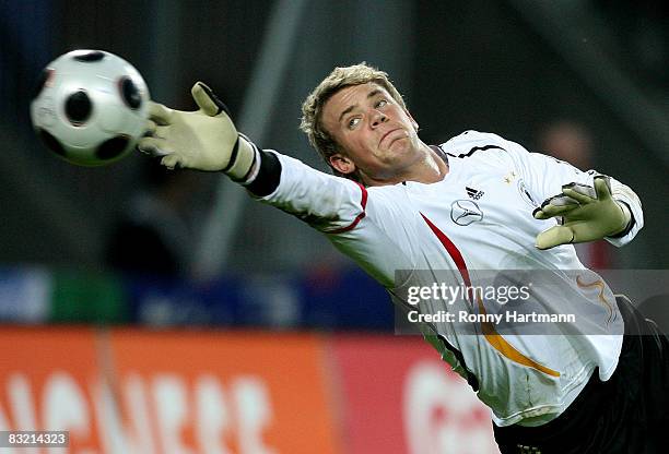 MAGDEBURG, GERMANY Germany's goalkeeper Manuel Neuer warms up before the UEFA U21 Championship Playoff Match between Germany and France at the...