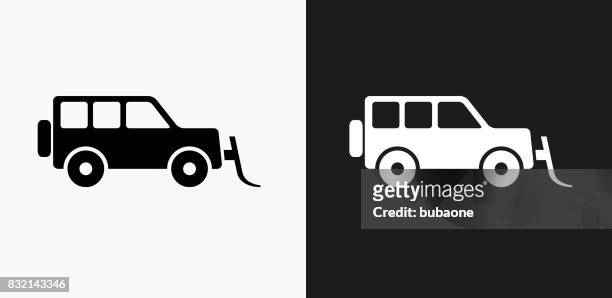 snow mover tractor icon on black and white vector backgrounds - snow white eps stock illustrations