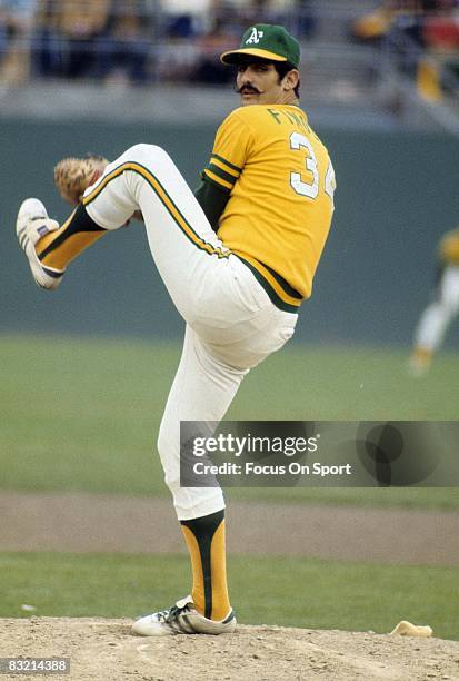 Pitcher Rollie Fingers of the Oakland Athletics pitches during a circa early 1970's Major League Baseball game. Fingers played for the Athletics from...